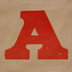 the letter a is painted red and white