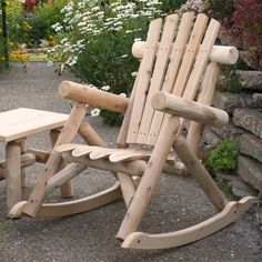 Enhance your porch or deck with the Lakeland Mills Country Cedar Log Rocking Chair. This chair is crafted from beautiful and sturdy Northern White Cedar trees that give this chair a rustic look. This wood is naturally durable, and won't rot or attract insects with prolonged use. This patio chair can be finished with a quality penetrating oil, or left to weather naturally to a silvery gray color. Some of the logs used may have cracks called checks that occur naturally, giving the set a more rustic look. These checks don't have any impact on the strength of the wood over time. The chair features a specially designed contoured seat that allows you to be in total comfort at all times, no need for seat cushions. The ends are perfectly rounded and sanded to avoid cutting into the backs of your l Kursi Outdoor, Garden Rocking Chair, Rustic Outdoor Furniture, Northern White Cedar, Adirondack Style, Adirondack Rocking Chair, Rocking Chair Porch, Porch Rocker, Cedar Log