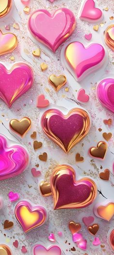 many pink and gold hearts on a white surface