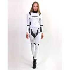 a woman in a star wars costume is standing with her hands on her hips and looking at the camera