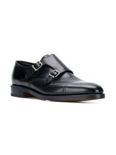 John Lobb Black Calf Leather William Buckled Shoes. Pure black calf leather shoes, almond toe, tonal stitching, top double buckle strap, leather lining, tonal sole.Gender: MENMaterial: 99%CALF LEATHER 1%RUBBERColor: BlackMade in: GBProduct ID: 228032L*Import tax/duty will be calculated at checkout (If applicable) Formal Monk Strap Shoes With Calf Leather, Timeless Calf Leather Monk Strap Shoes With Almond Toe, Formal Calf Leather Monk Strap Shoes, Calf Leather Dress Shoes With Tang Buckle, Calf Leather Dress Shoes With Buckle Closure, Formal Monk Strap Shoes In Calf Leather, Business Calf Leather Loafers With Buckle Closure, Business Loafers With Buckle Closure In Calf Leather, Calf Leather Shoes With Buckle Closure And Plain Toe