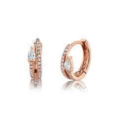 A pair of 0.19 carat diamond huggie earrings is a lovely choice, especially with a combination of dazzling pear-shape and round-cut diamonds. The 14K rose gold setting adds a touch of warmth and elegance. With the unique design, these huggies will make a charming accessory for various occasions, from casual outings to formal events. Luxury Single Diamond Rose Gold Earrings, Luxury Diamond Cut Round Huggie Earrings, Luxury Brilliant Cut Round Huggie Earrings, Luxury Gold Rose Cut Diamond Earrings, Luxury Rose Gold Diamond Earrings With Prong Setting, Luxury Single Cut Diamond Huggie Earrings, Luxury Diamond Cut Drop Huggie Earrings, Luxury Rose Gold Diamond Earrings With Elegant Design, Luxury Gold Round Cut Huggie Earrings