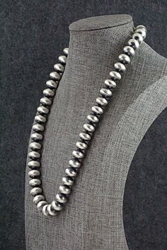 This sterling silver Navajo Pearl necklace was made by Navajo silversmith Bryannen Halwood.Necklace: 20"Bead size: 3/8" x 1/2" (9mm x 13mm)Free shipping on all orders! We ship with USPS and always include tracking. All orders ship within a day of payment.Returns are accepted up to 30 days after you receive your order. Just send us a message. Our shop offers cash back or store credit. The item must be returned in new condition. Native American Jewelry, Free Jewelry, Pearl Necklace, Sterling Silver, Beads, Free Shipping, Silver, Native American Jewellery