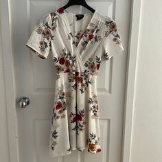 White Floral Dress. Washed By Never Worn. Bought For Wedding Festivities. Size Small White Floral Short Sleeve Dress For Brunch, White Flowy Short Sleeve Floral Dress, White Flowy Floral Dress For Wedding, White Flowy Floral Wedding Dress, Wedding Festivities, White Floral Dress, Floral Dress, Red White, Colorful Dresses