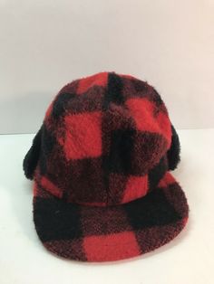 Vintage 100% Wool Plaid Red And Black Hunting Hat Cap With Ear Flaps Small. This is a nice vintage wool hat. There is no size listed but it is appears to be a size small. In good overall condition. See pictures for more info. Vintage Red Outdoor Hat, Red Vintage Outdoor Hat, Red Winter Baseball Cap For Outdoor, Red Baseball Cap For Winter, Red Winter Snapback Hat, Red Vintage Hats, Red Winter Baseball Cap, Vintage Red Flat Cap, Red Vintage Winter Hat