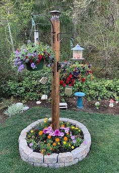 a wooden pole with flowers growing in it