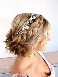 a woman wearing a hair comb with pearls on it's head and in the back