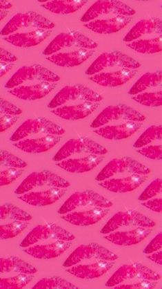 a pink background with shiny lips on it