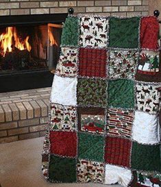 a blanket is draped in front of a fireplace