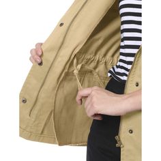 Elevate your outdoor style with this jacket. This jacket with two flap pockets boasting a waist drawstring inside ensures a custom fit. A snap placket covers a zipper closure and offers a rugged utility-style without weighing you down. Utility pockets, help store keys and other small items. Pair it with your favorite striped t-shirt and jeans for a casual trendy look. Beige Outerwear With Pockets For Outdoor Activities, Khaki Outdoor Parka With Patch Pockets, Beige Utility Jacket With Multiple Pockets, Beige Utility Outerwear With Side Pockets, Khaki Parka With Patch Pockets For Outdoor, Utility Beige Outerwear With Side Pockets, Casual Outerwear With Drawstring For Outdoor Activities, Beige Utility Jacket With Pockets, Beige Outerwear With Multiple Pockets For Outdoor