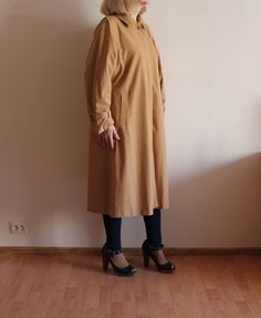 "Beige Trench Coat Brown Trenchcoat Vintage Coat Beige Coat Brown Womens Coat Vintage Trench Coat Outerwear Raincoat Large Size Shown on model M/L Measurements(lying flat): Length: 44\"/ 113 cm Sleeve(from the neck line): 28.5\"/ 72.5 cm Pit to pit: 24\"/ 61 cm Condition: great vintage condition. Label: Modena Please check measurements to insure a proper fit. Remember to allow yourself some extra room for movement. You can compare these with something from your closet that fits you well. Please Fall Raincoat With Buttons, Classic Long Sleeve Fall Raincoat, Beige Long Sleeve Raincoat For Fall, Brown Trenchcoat, Trench Coat Brown, Vintage Trench Coat, Beige Trench Coat, Beige Coat, Coat Vintage