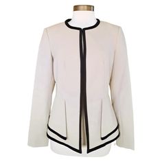 This Calvin Klein Collarless Contrast Trim Jacket Blazer Is An Elegant Option For Your Workweek Wardrobe White With Contrast Black Trim Long Sleeve High Round Crew Neckline Front Hook Closure Fully Lined Polyester/Rayon/Spandex Dry Clean Very Good Condition Size 6p Elegant Spring Career Outerwear, Chic Beige Blazer For Layering, Classic Calvin Klein Blazer For Spring, Elegant Calvin Klein Winter Blazer, Spring Office Blazer By Calvin Klein, Fitted Beige Blazer For Layering, Chic Calvin Klein Fall Blazer, Elegant Calvin Klein Blazer For Career, Elegant Calvin Klein Blazer For Fall