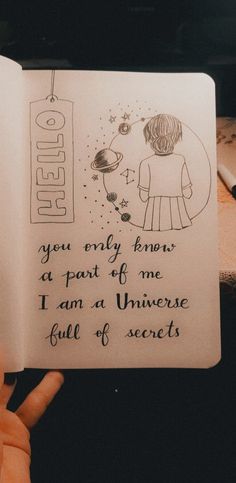 someone is holding up a book with an illustration on it that says, you only know a part of me i am a universe full of secrets