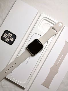 an apple watch in its box with the packaging