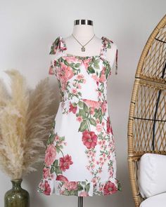 This beautifully constructed dress features a tie strap design, smock back with hidden zipper, romantic... Dress With Tie Straps, Mini Floral Dress, Romantic Floral Print, Dreamy Dress, Dress With Tie, Bad Habits, Strap Design, Floral Mini Dress, Hidden Zipper