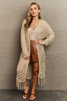 HEYSON Boho Chic Full Size Western Knit Fringe Cardigan
This cardigan features a luxuriously soft knit that feels gentle against your skin, ensuring ultimate comfort all day long. The trendy fringes add a touch of bohemian flair, making it a versatile piece that can effortlessly elevate any outfit. Whether you're heading to the office or a casual weekend outing, this cardigan is a must-have for staying warm, chic, and effortlessly fashionable. Long Summer Cardigan, Trendy Fringe, Chic Cardigan, Fringe Cardigan, Saint John, Casual Weekend, Western Fashion, Fashion Boutique, Knit Cardigan