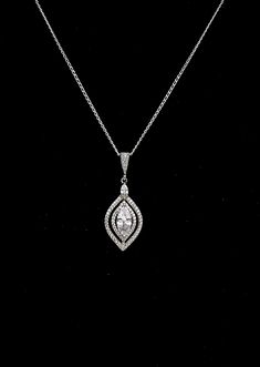 "Tarnish resistant rhodium silver plated metal framed marquise luxury AAA quality clear white cubic zirconia drop and bail with cubic zirconia deco. Comes with 16 or 18 inch sterling silver chain or 16-18\" adjustable rhodium silver plated brass chain. Pendant size with bail : 3.3cm x 1.4cm Matching earrings available and sold separately https://www.etsy.com/listing/618186130/bridal-jewelry-wedding-earrings?ref=shop_home_active_54&pro=1&frs=1" Bridal Jewelry Bracelets, Bridal Pendant, Engagement Necklaces, Necklace Bridal, Etsy Bridesmaid Gifts, Marquise Cut Diamond, Double Halo, Jewelry Bridal, Cluster Pendant