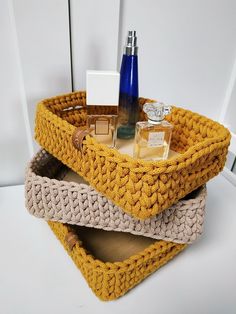 Rectangle basket, Makeup brush holder, makeup organizer basket tray, rectangular bathroom bin, knit cosmetics holder, modern farmhause tray Rectangular basket tray for cosmetics, etc. is made crochet from cotton string. The bottom is a plywood base, thanks to which the basket is very stable. The tray has two handles, which make it easier to move the tray. The basket is very stable. On photo color mustard and beige, but you can also order another color from the list. Price for 1 pc. The basket ca Cozy Perfume, Brush Holder Makeup, Rectangle Basket, Rectangular Bathroom, Rectangular Baskets, Bathroom Bin, Makeup Brush Holder, Perfume Tray, Basket Tray