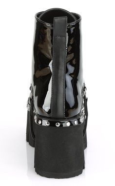 Slick black patent vegan leather ankle boots with metal front zip closure, shiny silver studs and D-ring harness strap. Ashes to ashes... allow these versatile platforms to lift you up and let you glide over the earth in comfort. Vegan Black Patent leather 3 1/2 inch heel 2 1/4 inch platform Ankle length U.S womens sizing - refer to size chart for more info Punk Style Patent Leather Platform Boots, Punk Patent Leather Platform Boots, Punk Style Platform Boots In Patent Leather, Alternative Boots, Hologram Shoes, Emo Boots, Black Patent Boots, Demonia Boots, Alternative Shoes