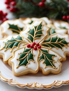 a decorated christmas cookie on a white plate