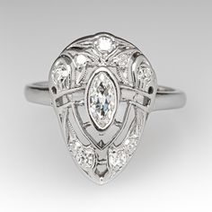 an antique style diamond ring in white gold