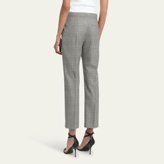 Alexander McQueen Prince of Wales trousers Cropped length High rise Side slip pockets; back welt pocket Straight legs Tab/zip fly Wool Made in Italy