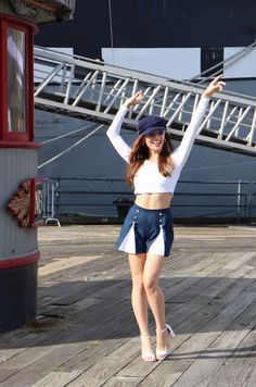 Our White Sail Scoop Neck Crop Top is a summer staple you cannot be without! Wear it with our Spinnaker Shorts or just about anything! Made of a fabulous cotton, with just enough stretch. Our little secret is that we double the fabric, which makes it look richer, fit better and hold up longer. Not your typical skimpy crop top! 95% cotton, 5 % spandex. Sewn in U.S.A. Made in USA95% Cotton, 5% SpandexFully LinedLong Sleeve Sporty Bottoms For Summer Day Out, Sporty Stretch Shorts For Day Out, Stretch Beachwear Shorts For Day Out, Stretch Cotton Shorts For Poolside, Fitted Shorts For Day Out At The Beach, Fitted Sporty Shorts For Day Out, Sporty Fitted Shorts For Day Out, Fitted Athleisure Shorts For Day Out, Sporty Fitted Bottoms For Summer