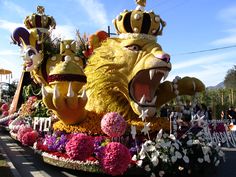 the float is decorated with flowers and other decorations