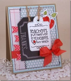 a teacher's day card with a red bow on the side and a tag hanging from it