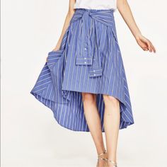 Zara Striped Midi Skirt 4886/083 Limited Edition Shirt-Style Midi Skirt With Sleeves Belt Details. Side Zip New With Tag Composition 72%Cotton 25%Polyamide 3%Elastane Approximate Measurement Laying Flat Waist 13” Front Length 22” Back Length 34” Bin 5 Spring Pleated Asymmetrical Skirt, Spring Striped Flared Skirt, Spring Striped Midi Skirt, Striped Midi Skirt For Spring, Striped Long Skirt For Spring, Spring Long Striped Skirt, Spring Striped Long Skirt, Summer Pleated Midi Wrap Skirt, Casual Flowy Midi Wrap Skirt