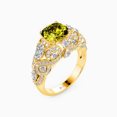 a yellow diamond ring with white diamonds on the sides and an oval shaped center stone