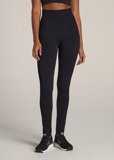 American-Tall-Women-Seamless-Compression-Legging-Solid-Black-front Seamless Elastane Leggings For Workout, Seamless Elastane Workout Leggings, Casual Black Seamless Leggings, Micro-elastic Black Yoga Pants, Seamless Elastane Leggings For Training, Versatile High Stretch Black Leggings, Versatile Black Elastane Tights, Functional Seamless Micro-elastic Leggings, Versatile Tight Black Yoga Pants