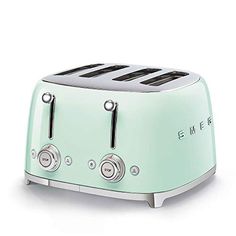 the smegle toaster is mint green and has four slices on each side