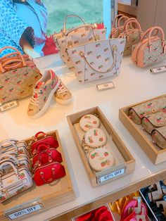 strawberry themed brand name purses Cute Handbags Purses, What’s In My Coach Bag, Strawberry Bag, Strawberry Coach Bag, Coach Strawberry Bag, Mini Purse Keychain, Coach Bags Strawberry, Kawaii Items Handbags