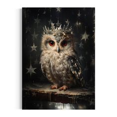 an owl wearing a crown sitting on top of a wooden table with stars around it