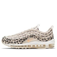 The Nike Womens Air Max 97 SE is a sneaker with a unique design. It features twin inspirations drawn from the natural world and has a reflective finish that mimics a water ripple effect. The textile and suede upper is covered in an all-over graphic made up of numerous leopard spots, offering a touch of glamour. It's mounted on a polyurethane midsole with full-length Max Air cushioning for superior comfort. (SNKR/Low Top/Women's/Non-Slip/Wear-resistant) Water Ripple Effect, Nike Symbol, Air Max 90 Premium, Orange Camo, Marathon Running Shoes, Air Max Women, Leopard Spots, Air Max Plus, Marathon Running