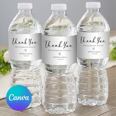 three water bottles with thank you labels on them