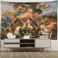 a large painting on the wall in a room