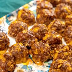 several balls of food on a colorful plate