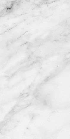 a white marble textured background with black and grey accents