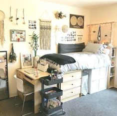 a bedroom with a bed, desk and mirror