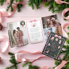 an open christmas card with pink ribbon and pine cones