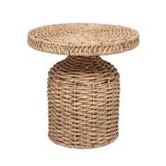 a wicker table with a round top on an isolated white background for use as a side table