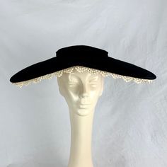 Fabulous 1940's Wide Brim Hat From Dalton's Department Store In Minneapolis, Mn. This Hat Is A Perfect Example Of The New Look And Was Probably Worn With A Fabulous Fit And Flare Dress And Swing Coat. The Outside Is Black Velvet With A 5/8" Crown And A Velvet Bow. The Inside Of The Brim Is Layers And Layers Of Beautiful Off White Lace. Brim Is A Mid Century Triangle Shape (Like The Coffee Tables) With A Peak In The Front. Brim Measures 5" In Front, 5.5" On The Sides And 3 1/3" In The Back. Total Vintage Hats, Costume Collection, Hat Pin, Cool Hats, Wide Brimmed Hats, Triangle Shape, Brim Hat, Winter Hat, Wide Brimmed