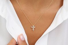 "14k Solid Gold Diamond Cross Necklace / Cross Necklace / Diamond Cross Pendant / Diamond Necklace / Tiny Diamond Cross / Christmas Gift Features * Made to Order. * Gold Kt: 14K * Custom Gold Color: Rose Gold, Yellow Gold, White Gold * Cross Height & Width: 12MM X 9 MM * Round Diamond: 6 pcs 2.2MM * Total Number of Stones: 6 * Total CTW: 0.26 ctw * Diamond Color-Clarity: G Color SI Clarity * Setting Type: Bezel Setting * Ready to Ship in 7-10 Business Days If you have any additional question Fine Jewelry Anniversary Cross Pendant Necklace, Fine Jewelry Cross Pendant Necklace For Anniversary, Fine Jewelry Anniversary Necklace With Cross Pendant, Fine Jewelry Cross Pendant Necklace With Gemstone, Fine Jewelry Gemstone Cross Pendant Necklace, Fine Jewelry Cross Gemstone Necklace, Gemstone Cross Pendant Necklace For Anniversary, Fine Jewelry Gemstone Cross Necklace, Cross Shaped Gemstone Necklace Fine Jewelry