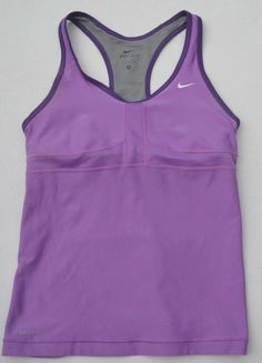 It says size M on it, but it fits smaller. Armpit to armpit: 15 inch, total length: 22 1/2 inch. Front panel: 92% polyester, 8% spandex. Back panel/Insets/bra front lining: 100% polyester. Bra back lining: 81% nylon, 19% spandex. Bra cup: 94% polyester, 6% spandex. Purple Sleeveless Gym Tops, Sporty Sleeveless Purple Top, Sporty Purple Sleeveless Top, Purple Sleeveless Sporty Top, Nike Sporty Sleeveless Vest, Purple Sleeveless Moisture-wicking Top, Nike Sleeveless Sports Vest, Nike Casual Sleeveless Vest, Casual Nike Sleeveless Vest