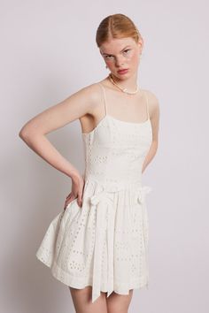 Complete with its mini length and a shirred back detail, our Penelope dress in white broderie truly sums up summer. •Mini length •Adjustable straps •Shirred back panel •100% organic cotton •Select your normal size •Designed in London MODEL INFO: Model is 5'10, is wearing a UK 10 and the length is 84cm from the shoulder. Damson Madder, Broderie Dress, London Models, Skirt Co Ord, Red Gingham, Home Dress, Pink Gingham, Rose Print, Yellow And Brown