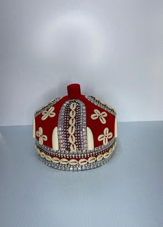 Discover the elegance and cultural significance of the African Crown Hat, a stylish and traditional piece perfect for any occasion. This Nigerian Igbo Traditional Red Odogwu Igwe Hat embodies the rich heritage of the Igbo people, making it an excellent gift for your husband or boyfriend. Crafted with meticulous attention to detail, this red igwe hat is not just a fashion statement but a symbol of honor and respect in Igbo culture. The Odogwu hat is designed for comfort and style, ensuring that i Traditional Ceremonial Headpiece With Pinched Crown, Traditional Round Crown Wedding Headpiece, Traditional Wedding Headpiece With Round Crown, Traditional Red Party Hat, Traditional Red Hat With Round Crown, Traditional Ceremonial Headpiece With High Crown, Traditional Costume Hat With Structured Crown, Traditional High Crown Costume Hat For Wedding, Traditional Handmade Wedding Hats And Headpieces