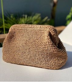 Raffia Pouch Clutch Bag | Handmade Summer Women's Hand bag | Straw Beach Clutch 🍃With its large interior volume, comfortable, trendy and very light structure, it is with you from city life to the beach😍   📌Erasable Raffia rope  📌Premium duck linen lining 📌Meticulous craftsmanship 📌All handcrafted 📌Special products for you 🎁International fast and free shipping   🤎timeless and quality handmade crochet products ✅Daily use, a fashionable women's accessory for special occasions! A nice and c Beach Clutch, Crochet Products, Holiday Bag, Bag Handmade, Women Supporting Women, City Life, Handmade Bags, Clutch Handbag, Hand Bag