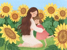 a woman and child are sitting in a field of sunflowers with one holding the other